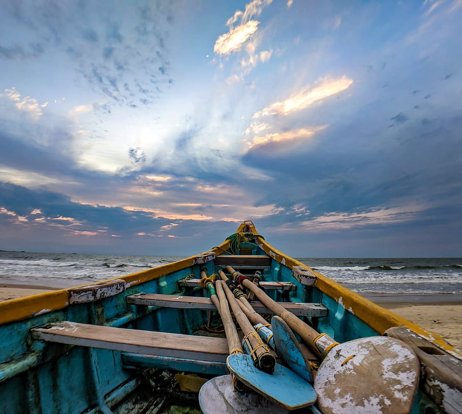 Blue and Beige Boat on Sand Near Ocean, beach, clouds, daylight HD wallpaper