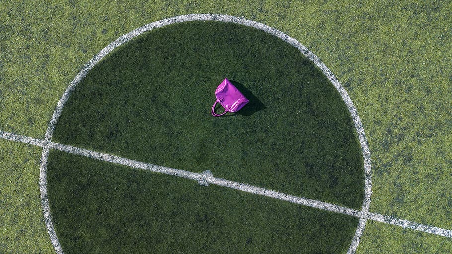 Pink Tote Bag On Football Field, aerial shot, bird's eye view