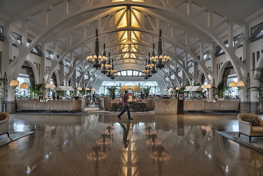 man walking inside building, indoors, architecture, reflection HD wallpaper