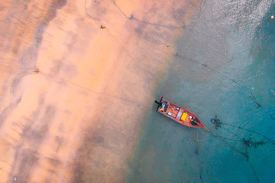 Top View Photo of Boat on Body of Water, aerial, aerial photography