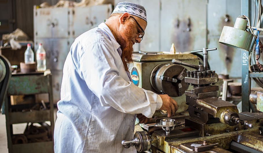 man using industrial machine, person, human, people, bottle, hat HD wallpaper