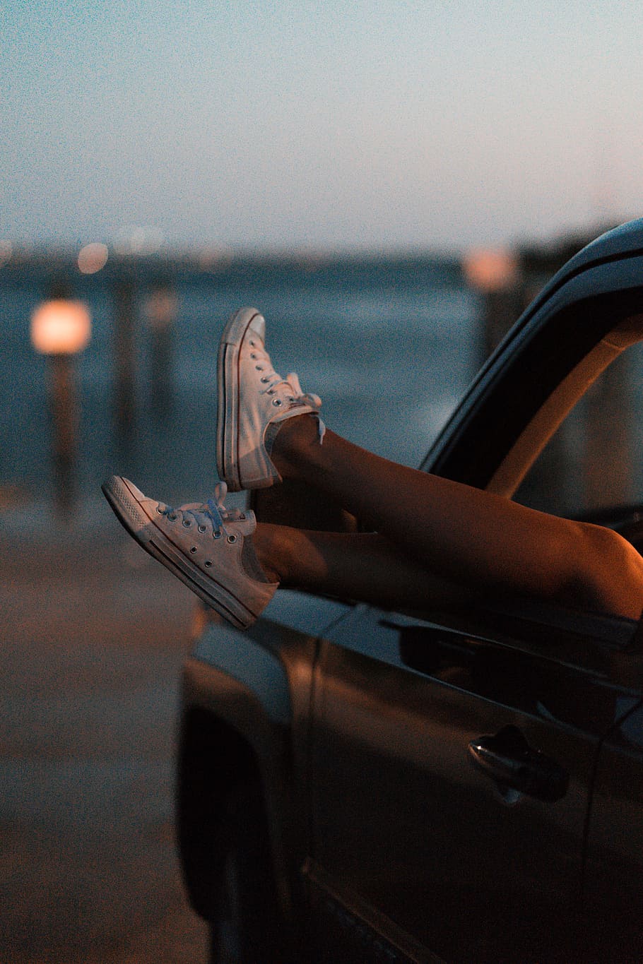 selective focus photography of person wearing white low-top sneakers inside vehicle, HD wallpaper