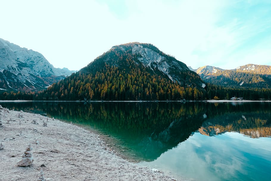 mountains beside lake, water, outdoors, italy, braies, lago di braies