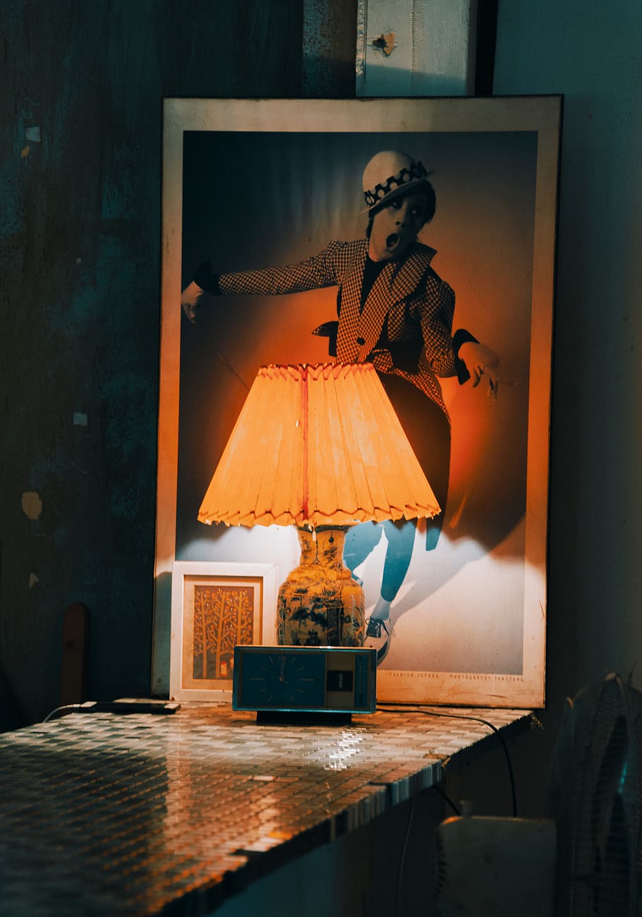 Lamp Near Frame On Table, illuminated, light, photo, human representation HD wallpaper