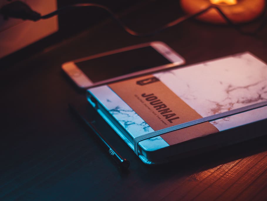 Journal Book, close-up, desk, electronics, iphone, lights, mobile HD wallpaper