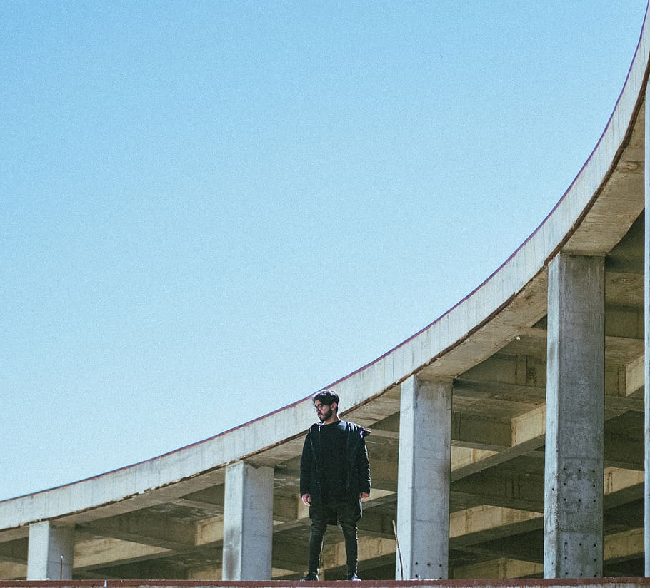 man standing on concrete surface during daytime, road, person HD wallpaper