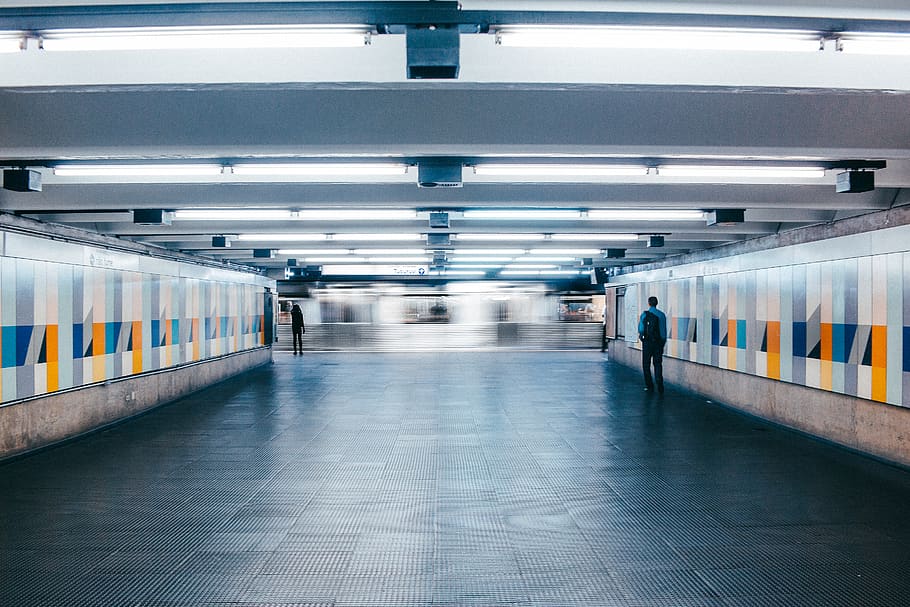 Man Walking on Subway Lobby, architecture, blur, building, indoors HD wallpaper