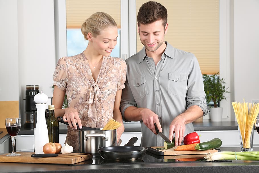Couple Cooking, adult, blond, brunette, dinner, enjoyment, family, HD wallpaper