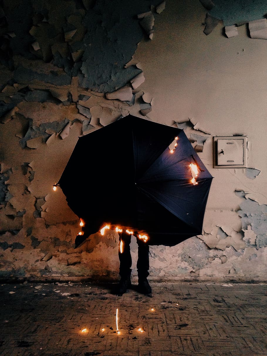 Photo of Burning Umbrella, fire, flame, heat, indoors, wall, real people HD wallpaper