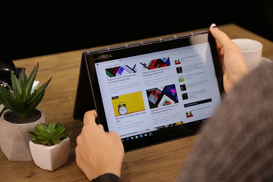 person using laptop, technology, table, indoors, computer, human hand HD wallpaper