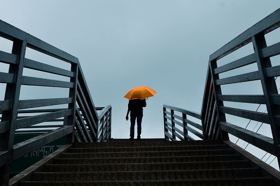 Person Holding Umbrella Standing Above Stairs, construction, contemporary HD wallpaper