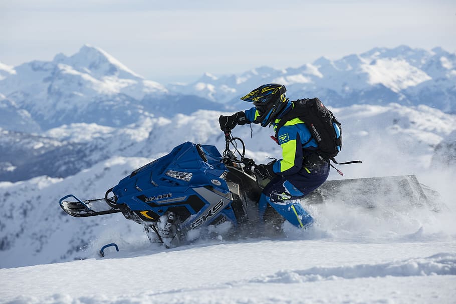 Man In Blue And Green Long-sleeved Suit Riding On Snowmobile, HD wallpaper