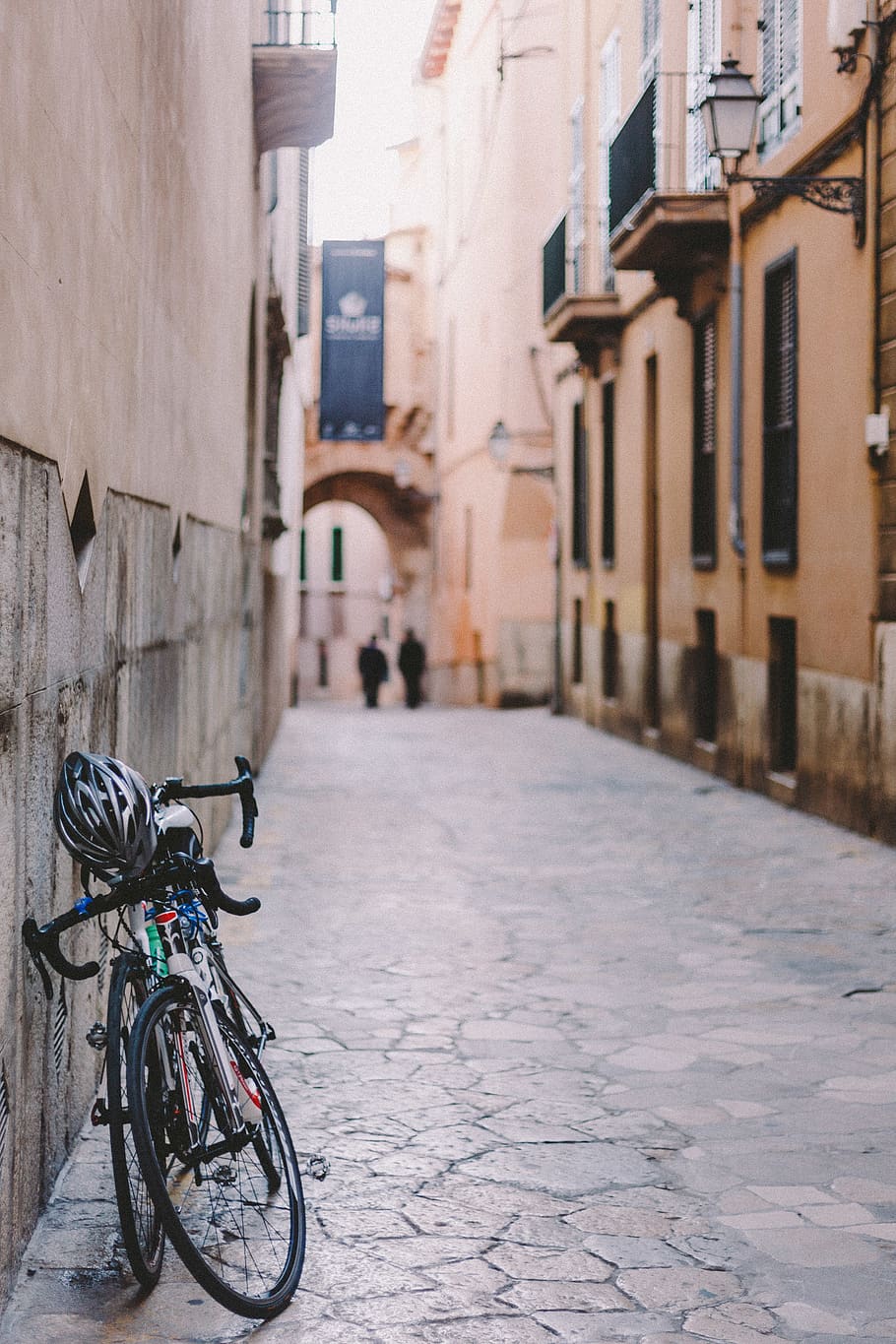 two bicycle parked on wall, bike, street, alley, city, urban HD wallpaper