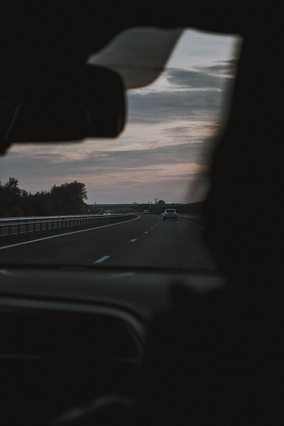 person driving vehicle during golden hour, road, highway, tarmac