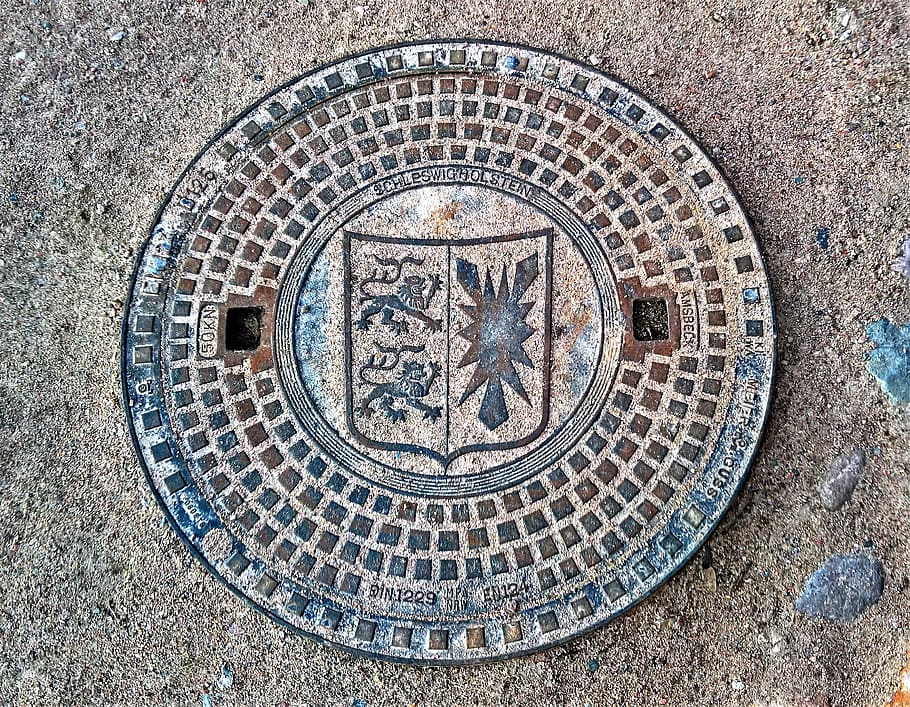 manhole cover, sieldeckel, coat of arms of schleswig-holstein