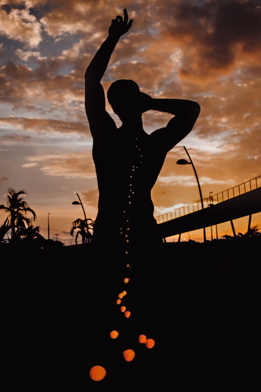 Silhouette Of Man Raising Hand, backlit, dawn, dusk, lights, person HD wallpaper
