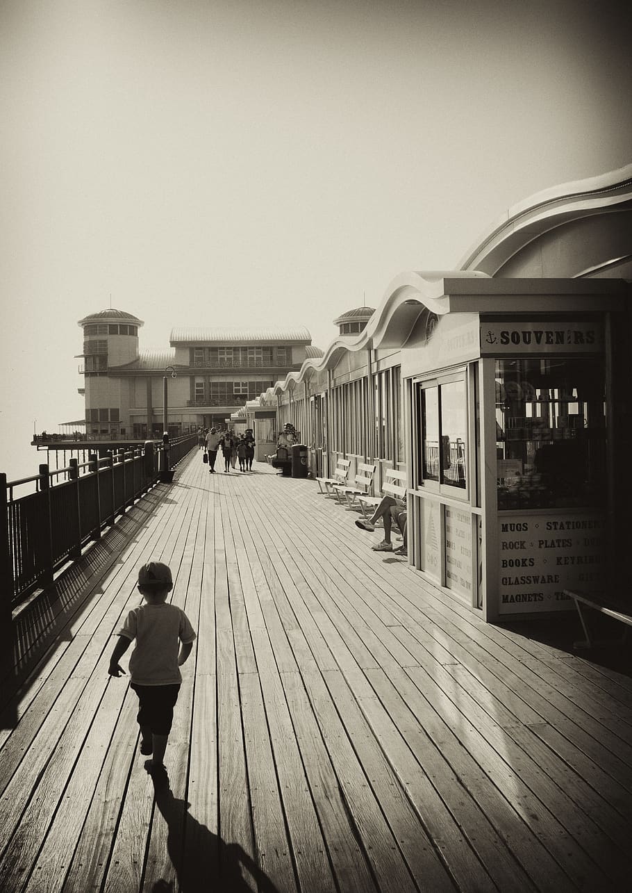 Boy Near Booth Standing at Daytime, architecture, black-and-white HD wallpaper