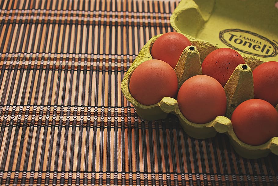 Egg fruit. Eggs on Red Container Top view.