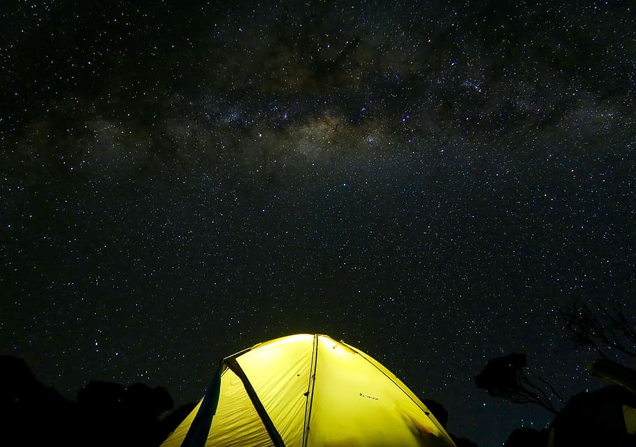 tent under black sky during nighttime