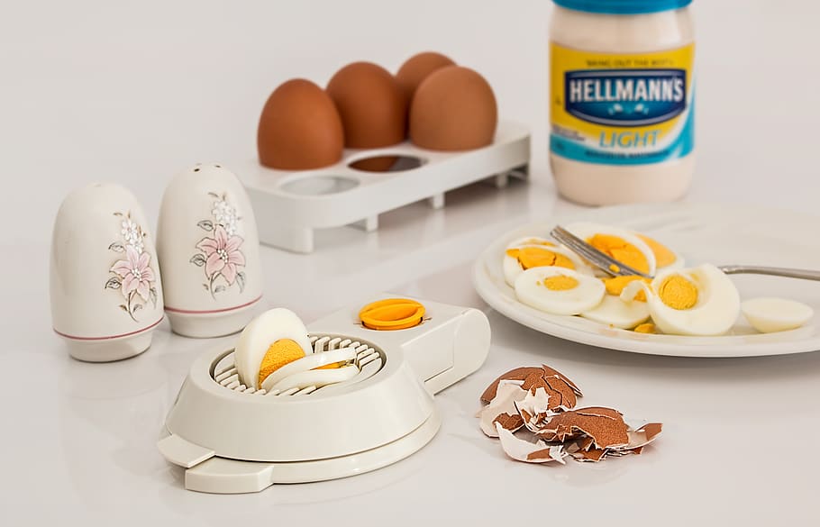 Hellmanks Glass Jar Beside White Egg Rack, cholesterol, egg slicer