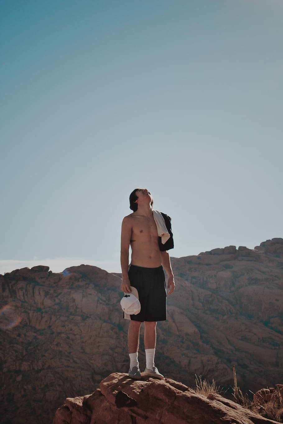 man standing on rock, skin, person, human, clothing, apparel HD wallpaper