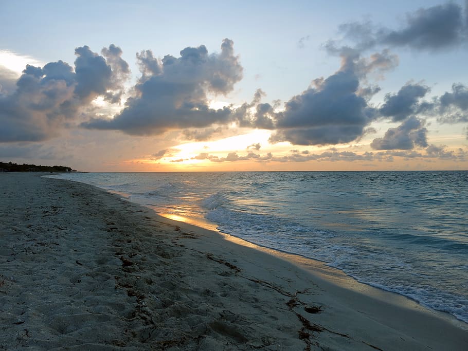 varadero, cuba, sunset, beach, reflections on the water, clouds