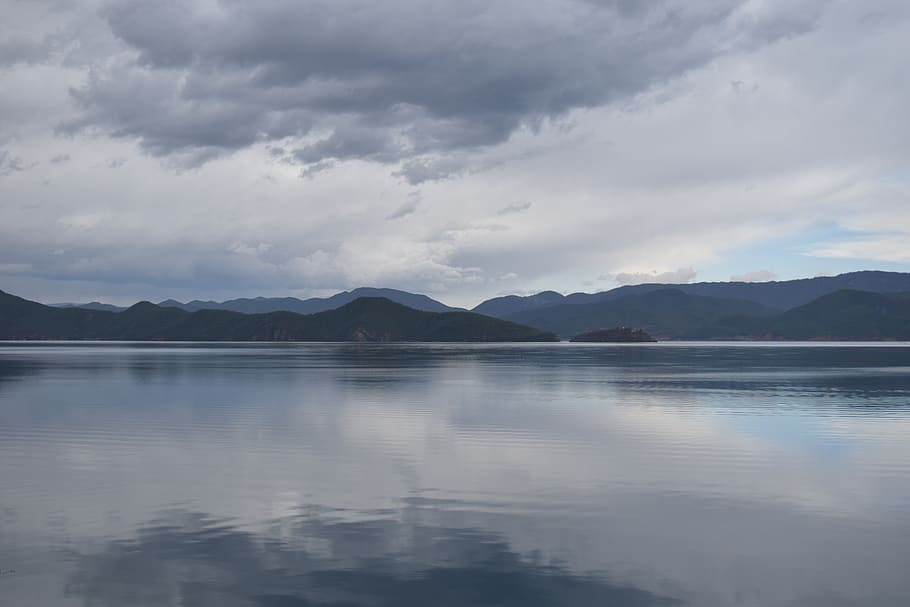 Photography of Mountains Near Body of Water, calm waters, clouds HD wallpaper