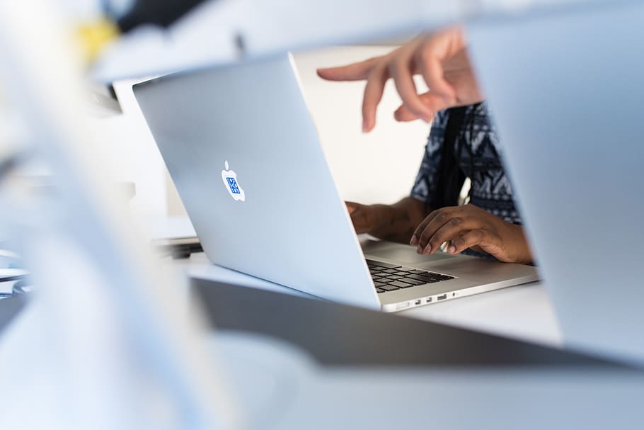 Person's Fingers Pointing in Macbook Pro, blur, desk, devices HD wallpaper