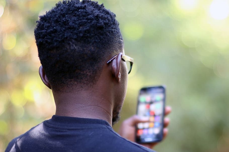 Selective Focus Photography Of Person Using Smartphone, man, headshot HD wallpaper