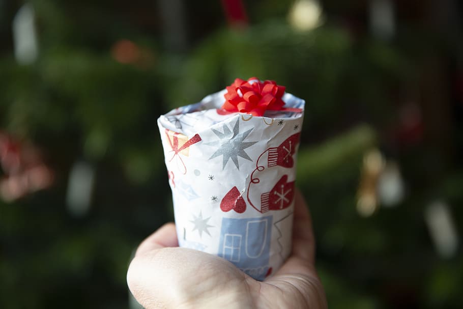 white and red gift pack, human hand, one person, human body part HD wallpaper