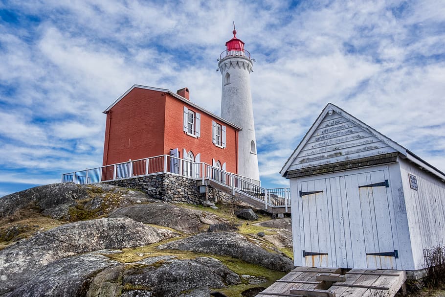 lighthouse beside brown barn, architecture, building exterior HD wallpaper