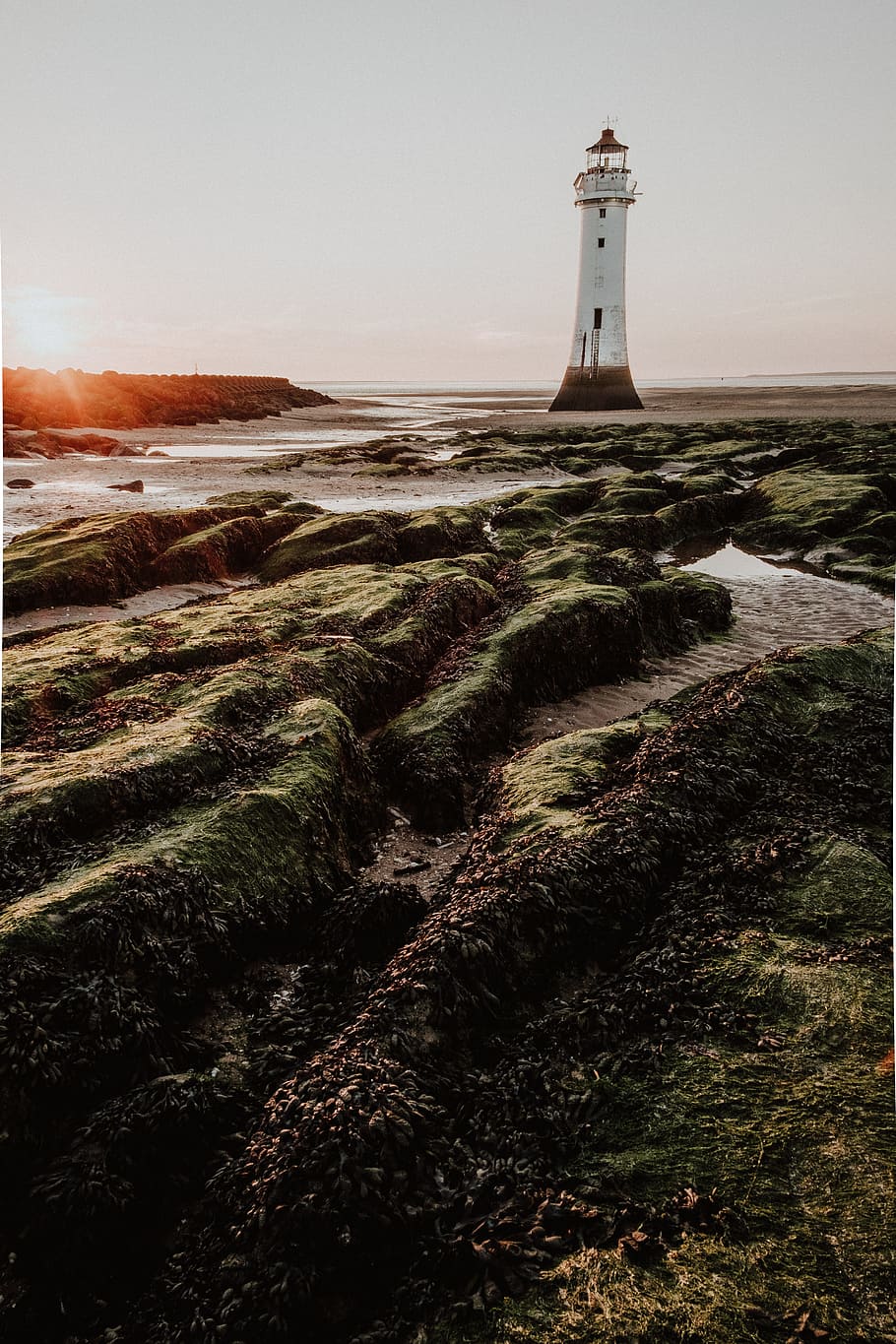 landscape photo of lighthouse, coastal, beach, sand, rock, horizon HD wallpaper