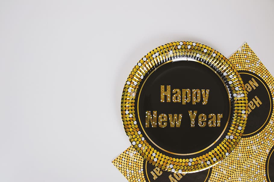 Happy New Year Concept with paper plate, copy space, gold colored HD wallpaper