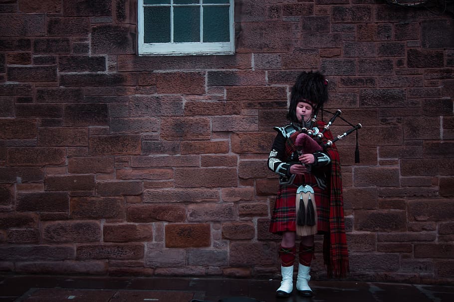 man playing Turkish flute, one person, brick, brick wall, standing HD wallpaper