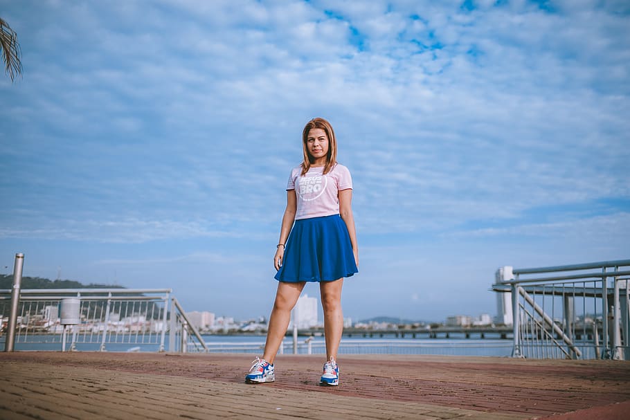 Woman Standing Under Blue Sky, beautiful, bridge, daylight, ocean HD wallpaper