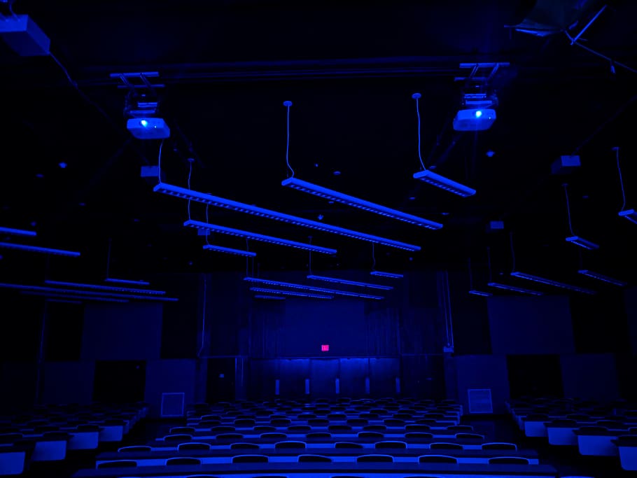 empty building interior with blue LED lights turned on, lighting