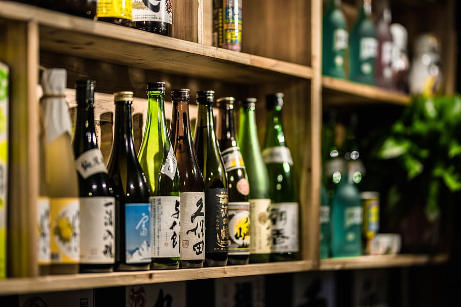 alcohol, drink, beverage, beer, shelf, bottle, sake, human