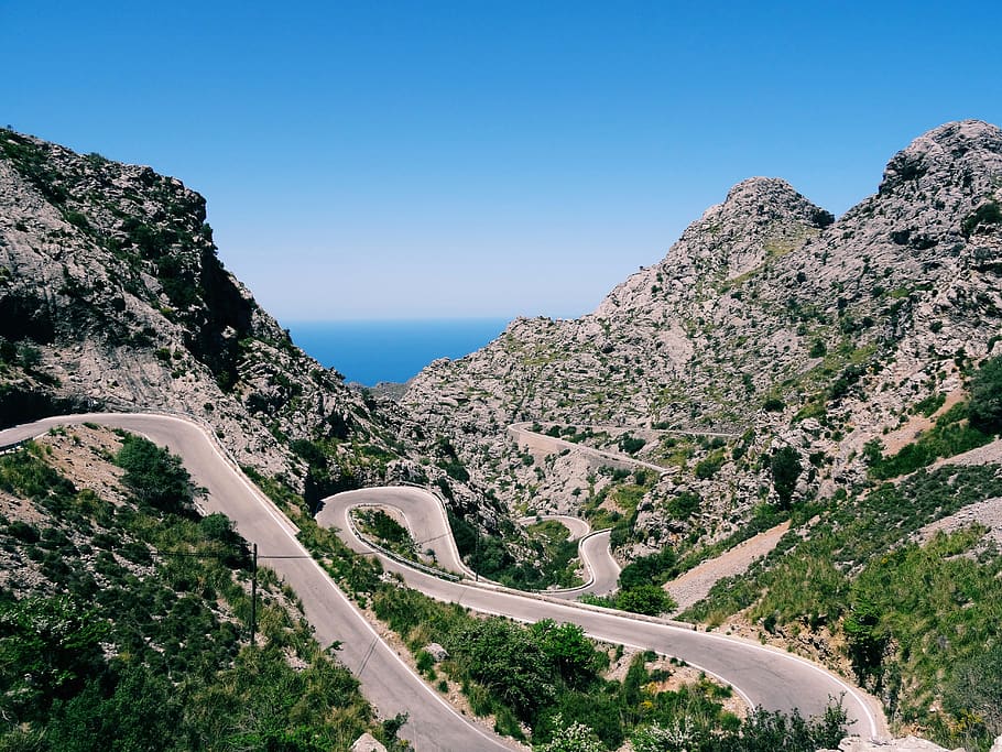 winding road, mountains, cliffs, blue, sky, ocean, sea, coast HD wallpaper