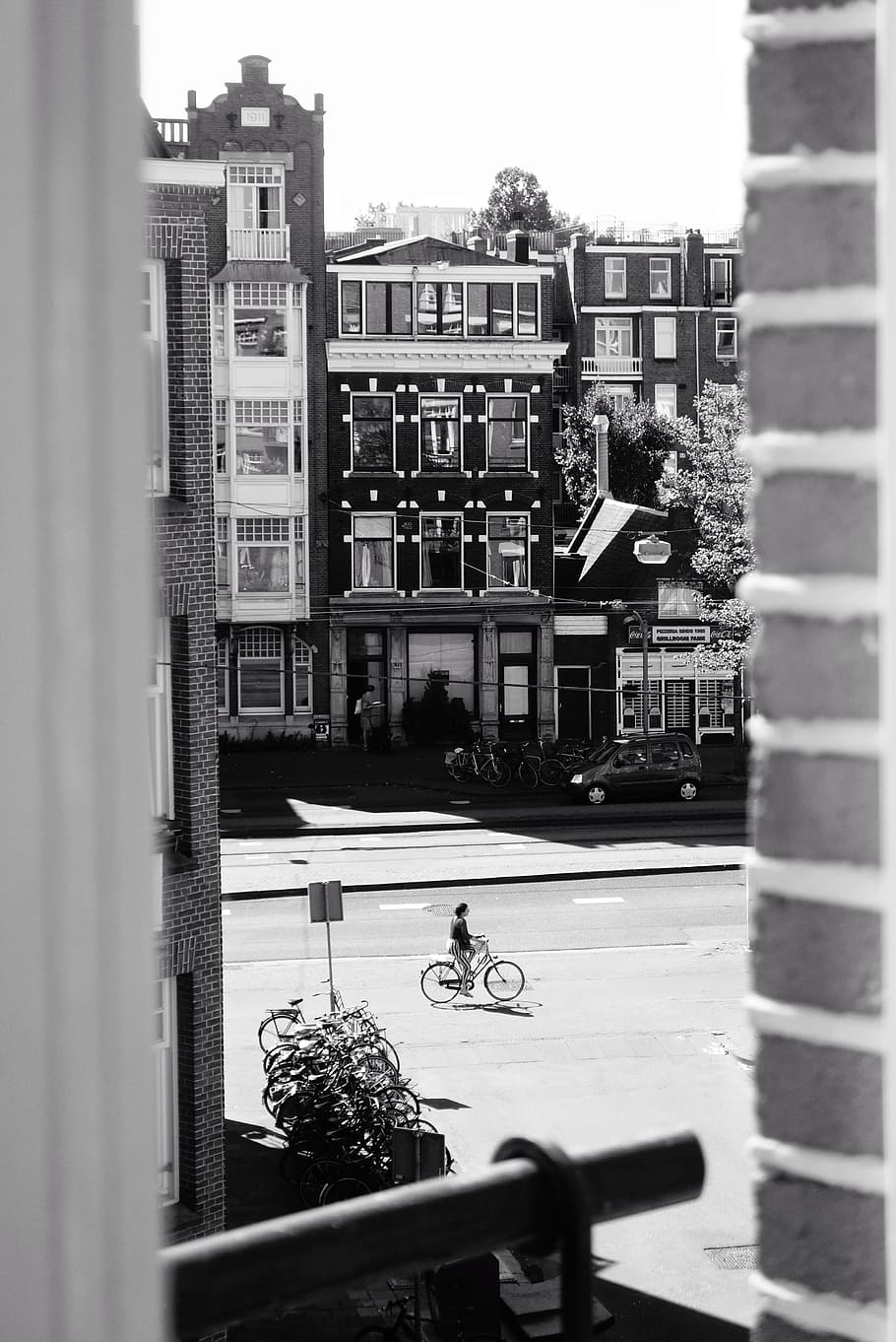 grayscale photo of buildings, cyclist, riding, bike, bicycle, HD wallpaper