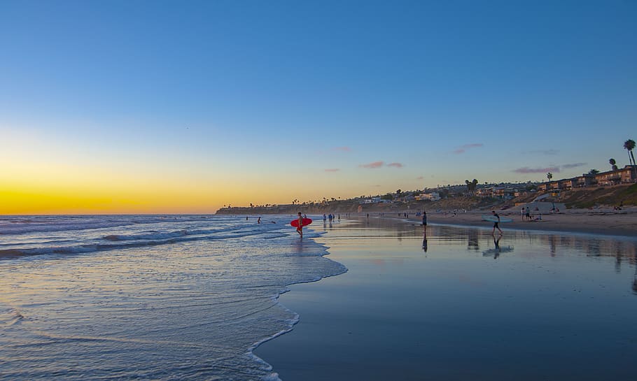 person standing on seashore, beach, pacific beach, ocean, sunset HD wallpaper