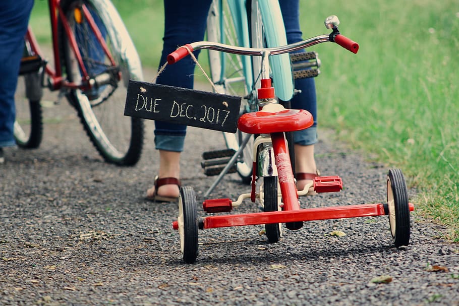 Toddler's Red Tricycle, bicycle, child, fun, motion, pebbles HD wallpaper