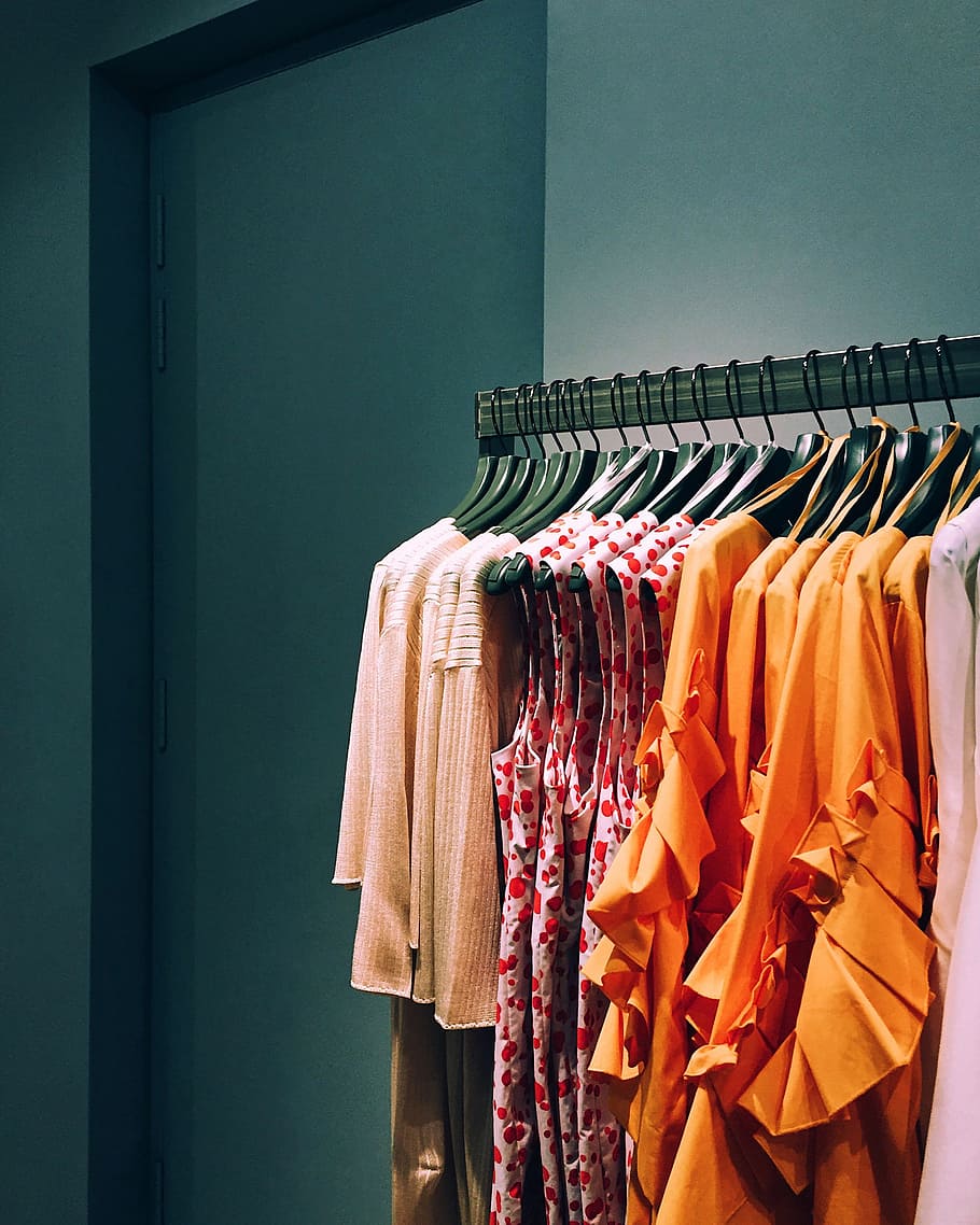 assorted-color shirt lot hang on rack, hanger, shopping, minimal