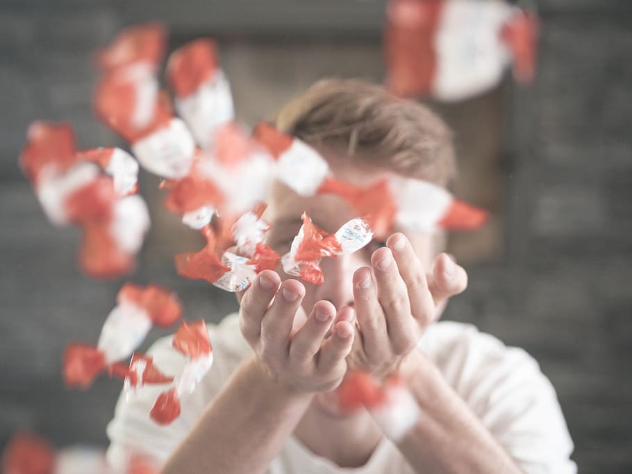 man scattering flower petals, headshot, portrait, holding, hand HD wallpaper