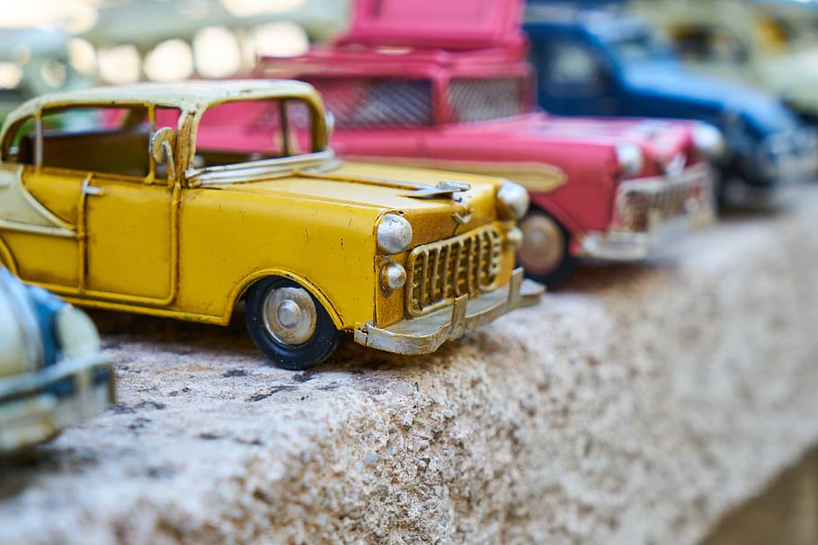 car, toy, tiny, yellow, pink, park, auto, vehicle, decoration HD wallpaper
