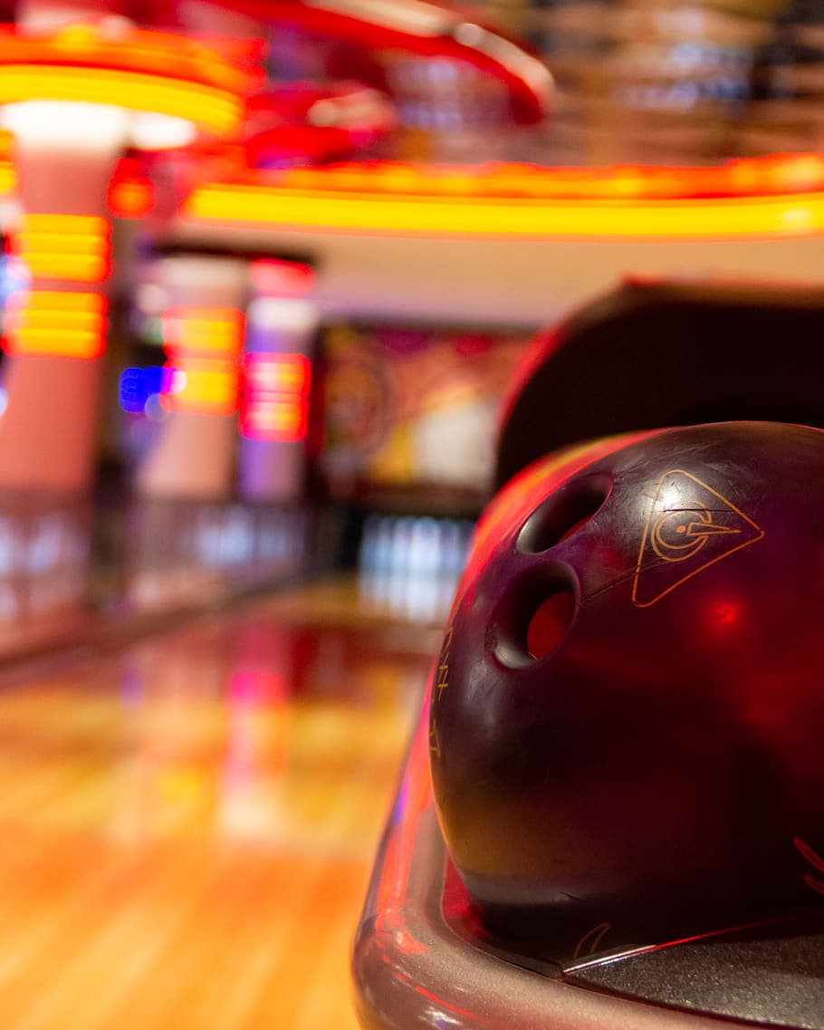 red bowling ball, close-up, indoors, no people, focus on foreground HD wallpaper