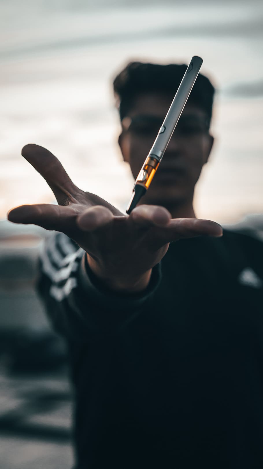 man holding pen type vaporizer, one person, real people, human hand HD wallpaper