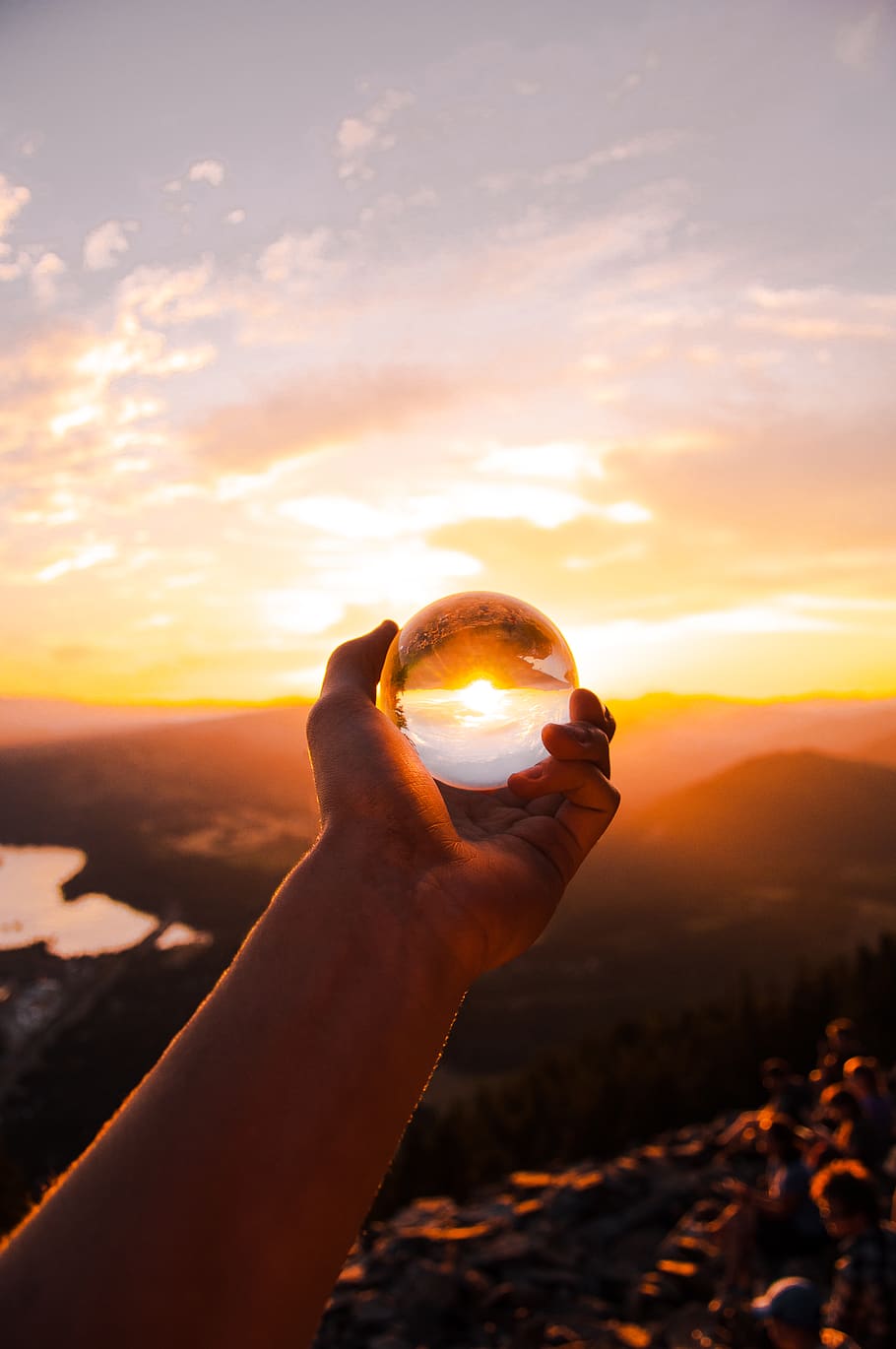Person Holding a Glass Ball, backlit, crystal ball, dawn, evening HD wallpaper