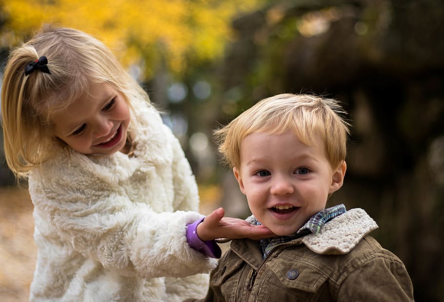 Girl Holding the Chin of Boy Outdoor, adorable, children, cute HD wallpaper