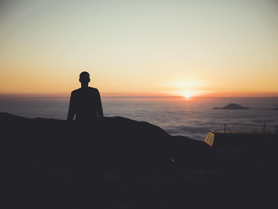 Silhouette of Person during Dawn, backlit, beach, cliff, evening HD wallpaper