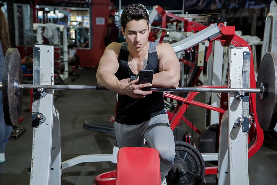Man Resting His Hands on Hanged Barbell, biceps, body, bodybuilder HD wallpaper